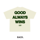 Beige t-shirt with 'GOOD ALWAYS WINS' text and logo on a white background