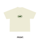 Beige t-shirt with a logo on the chest against a white background